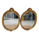 Paire de miroirs oval  doré vintage