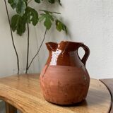 Glazed earthenware jug