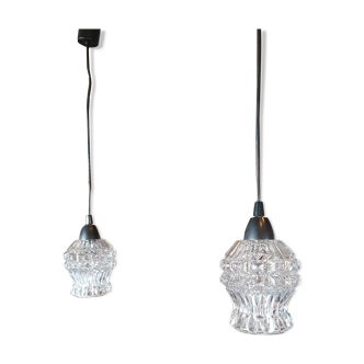 Pair of glass globe hanging lamps