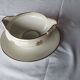 Sells sauceboat Elegant decoration of small golden roses,
