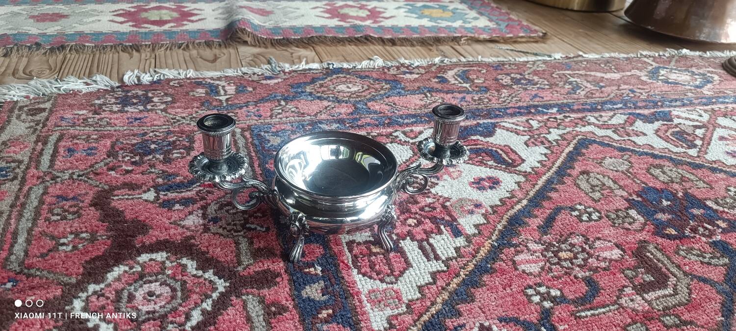 Silver-plated candlestick burns scented oil, Art Nouveau style, late 19th century.