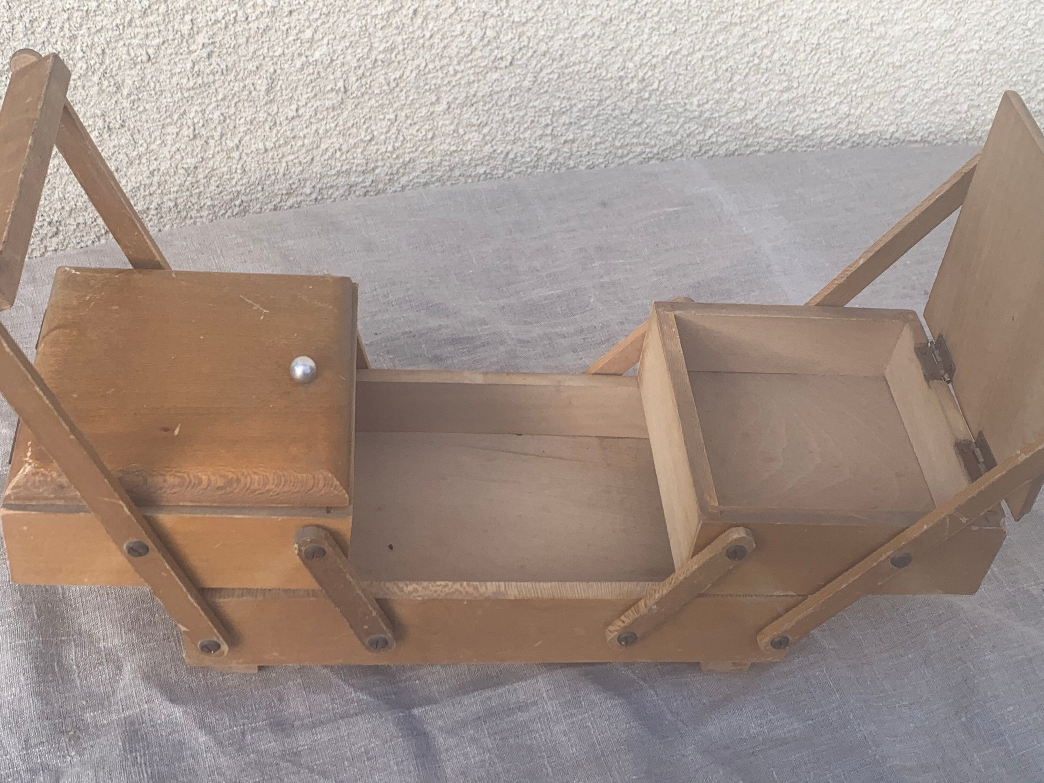 Sewing box in old varnished wood