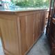 Low sideboard in light solid oak with 3 doors and 1 drawer.