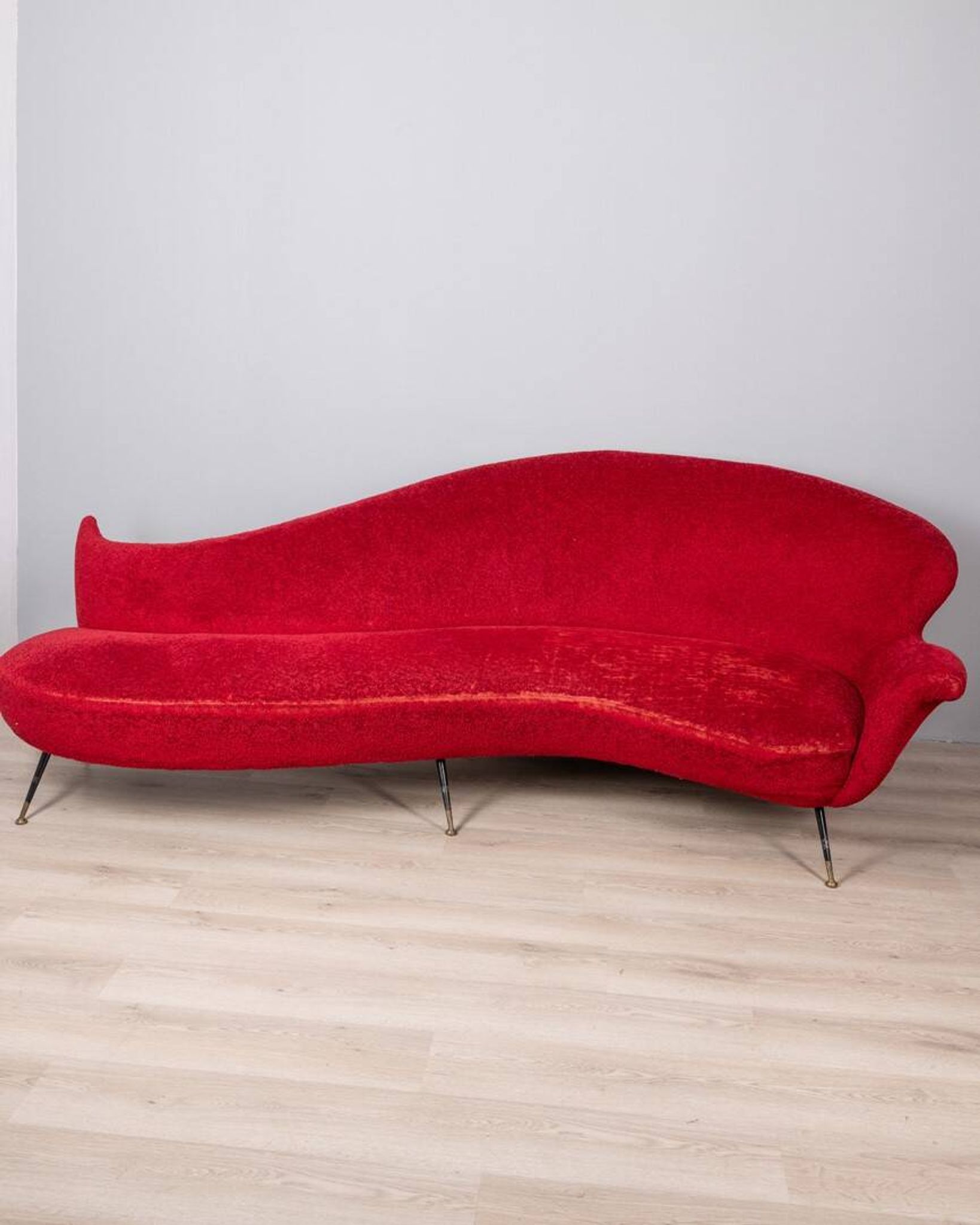 Large 1950s vintage curved sofa in red velvet italian design
