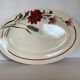 Plat faïence fleurs grenats modèle Artois Sarreguemines