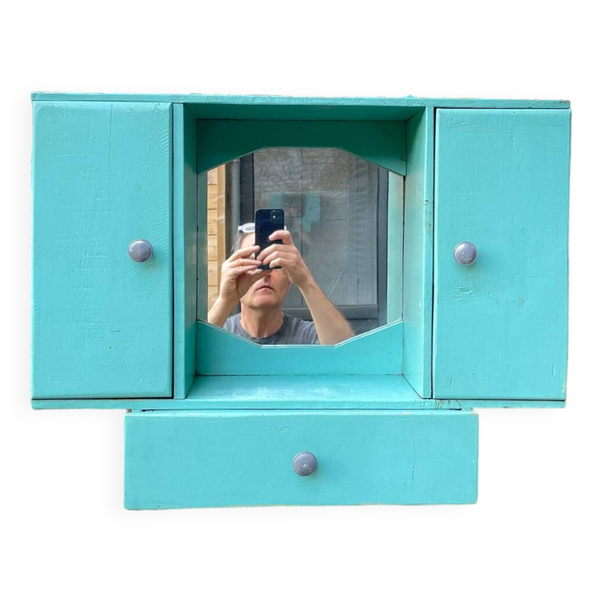 Old wall-mounted bathroom cabinet