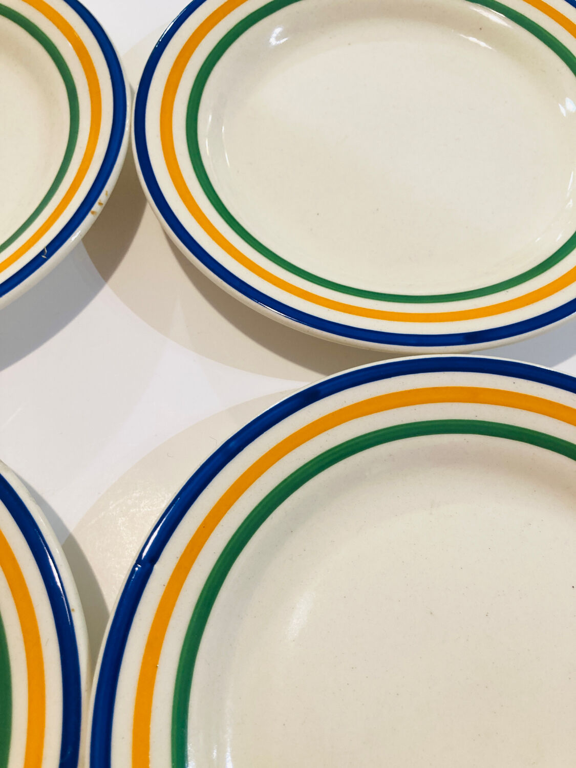 4 striped earthenware plates made in Romania