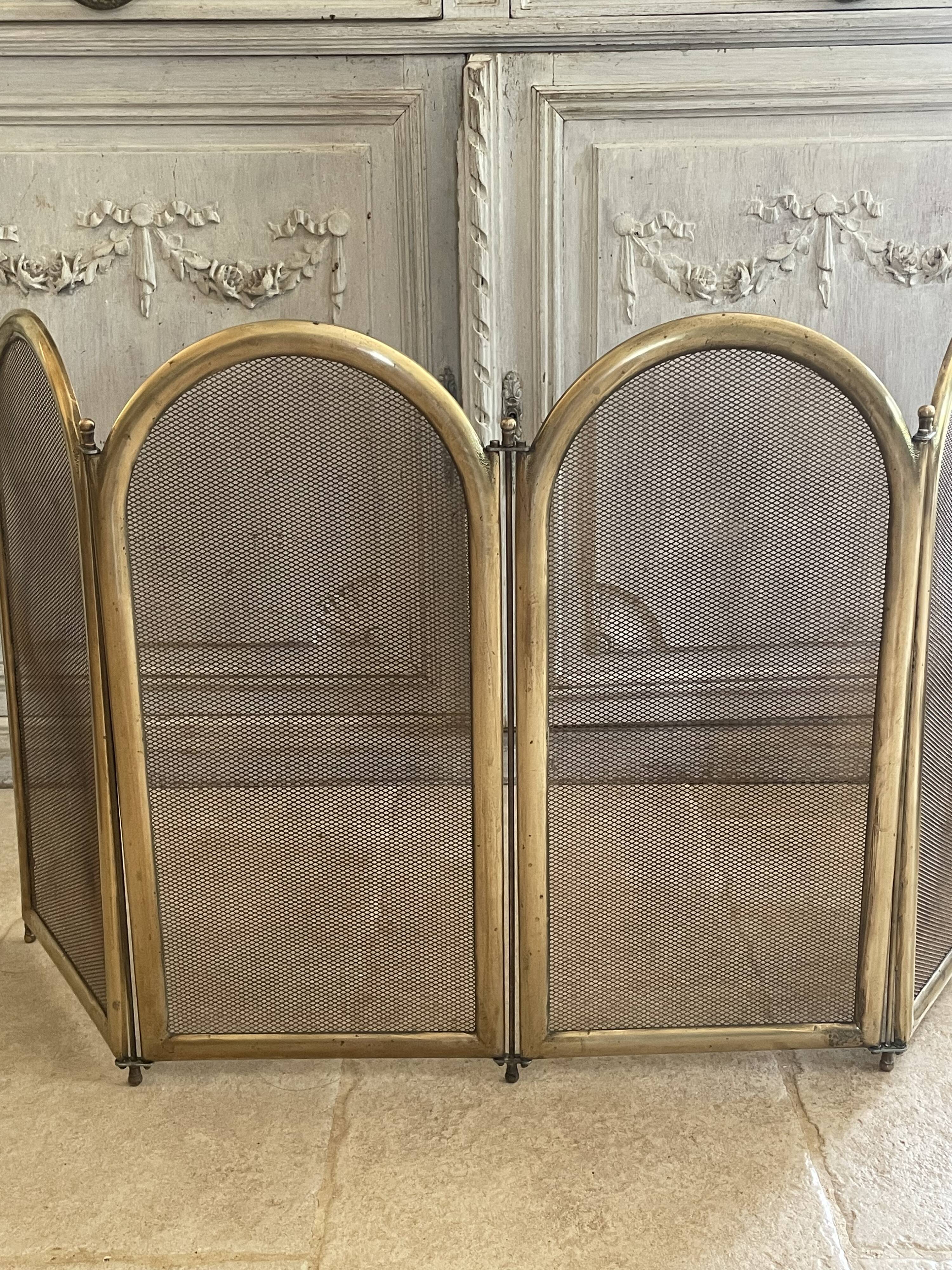 Vintage brass fireplace screen, folding spark guard with 4 panels,