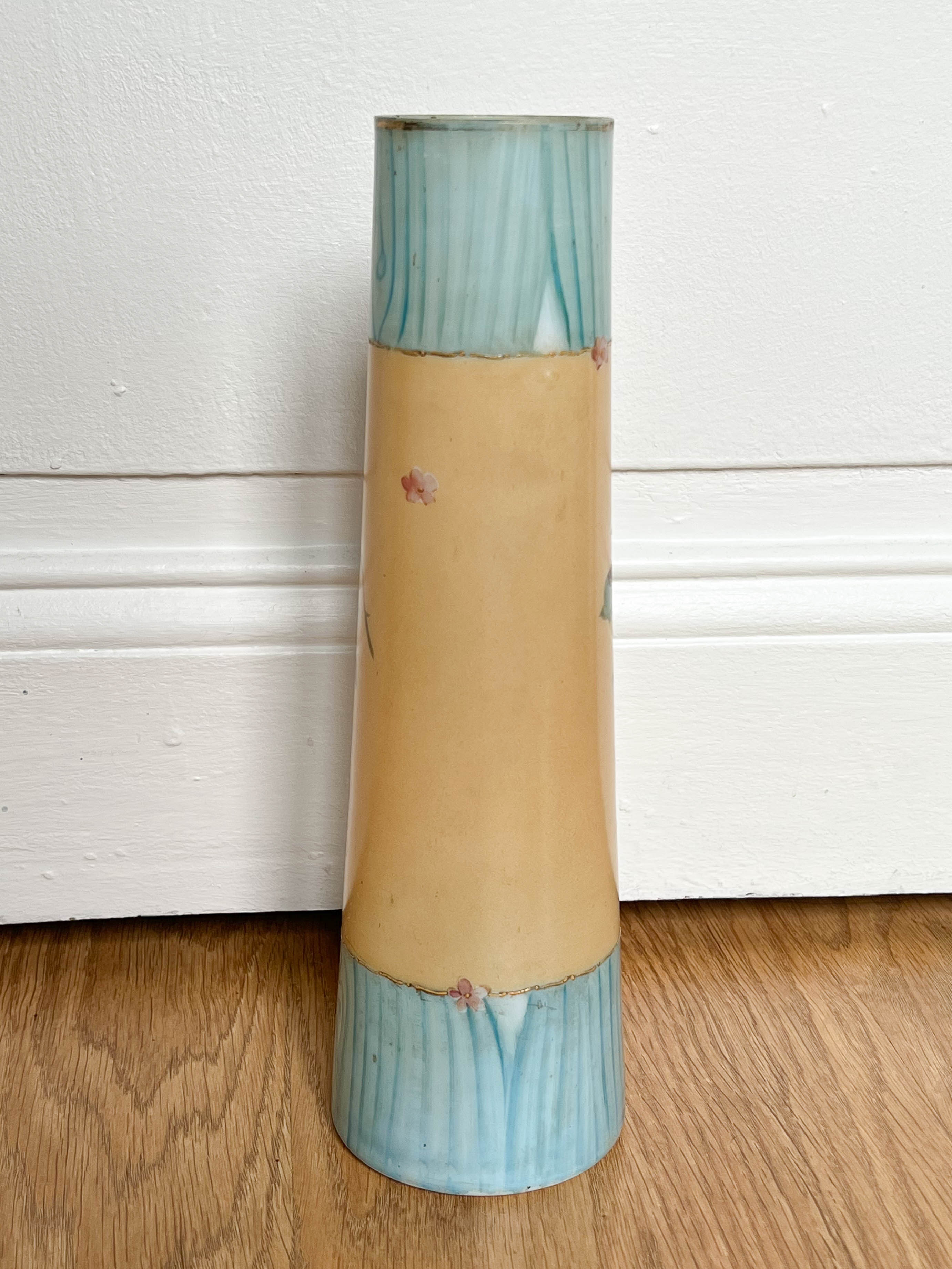 Blue and beige vase with flower pattern
