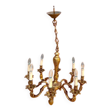 Antique chandelier in solid gilded brass, Louis XV rococo style, with 8 lights – 1950s to 1970s.
