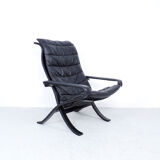 Westnofa black leather Flex armchair with ottoman