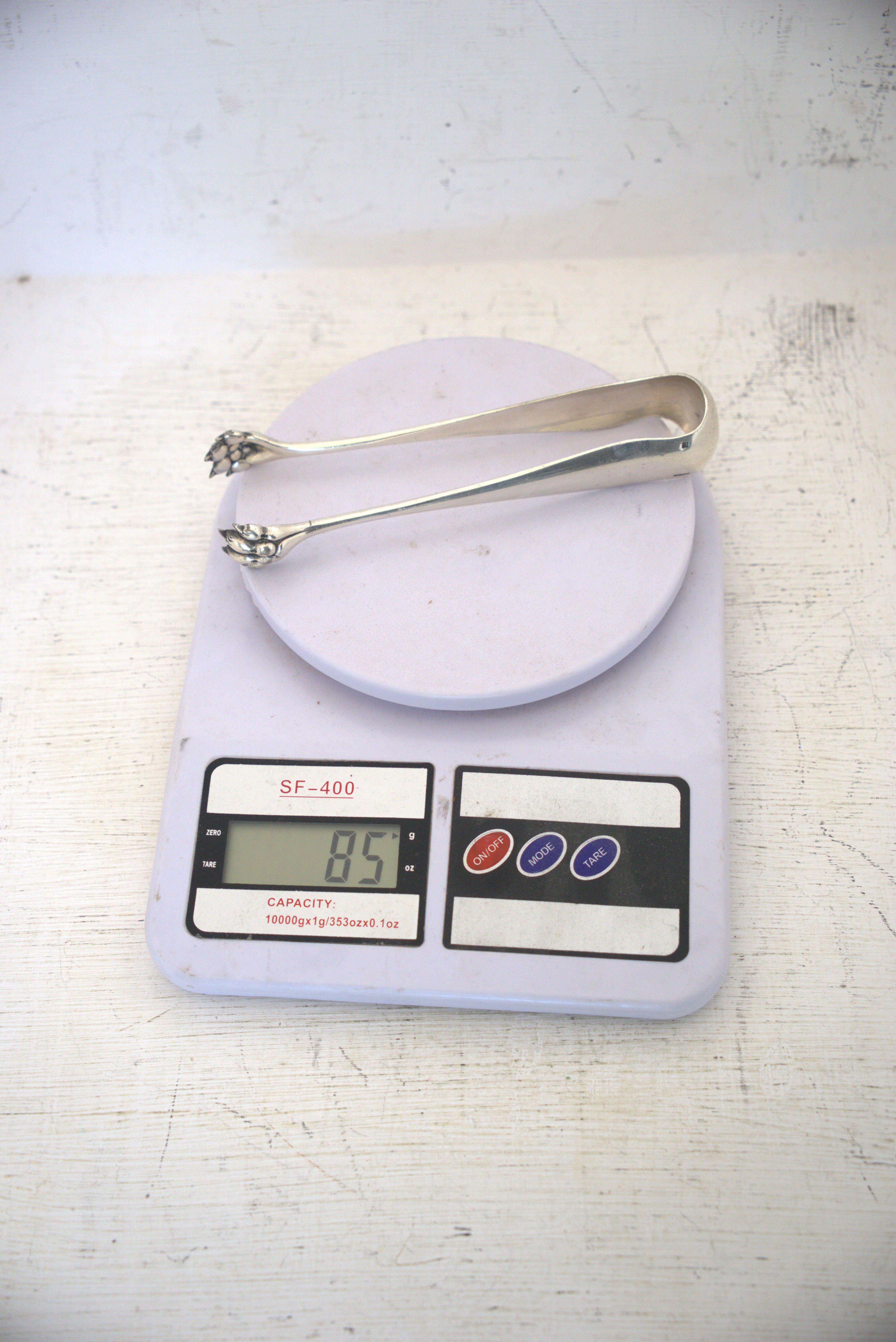 Silver metal candy box and pliers