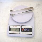 Silver metal candy box and pliers