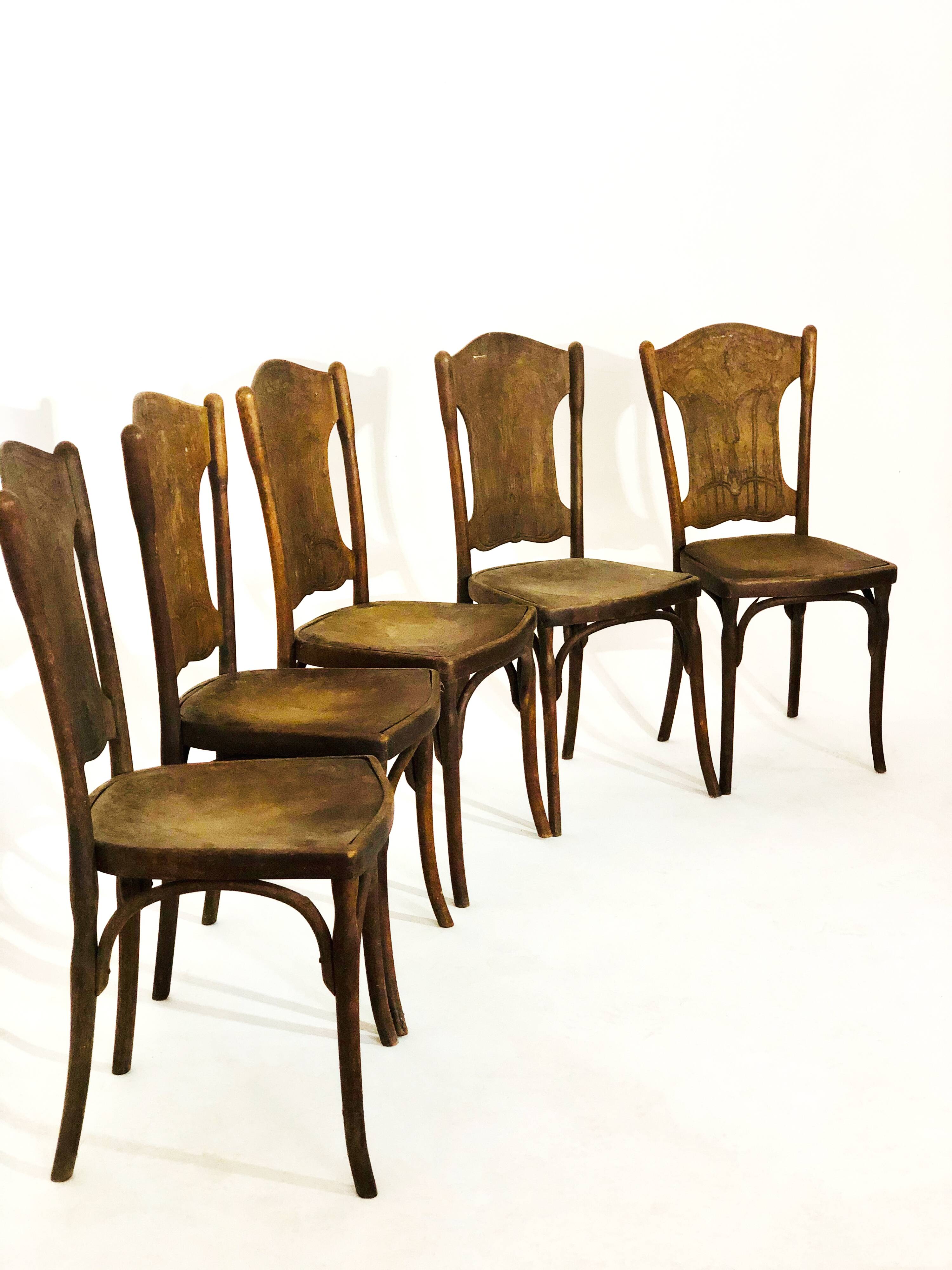Suite of 5 vintage J.J Khon oak chairs