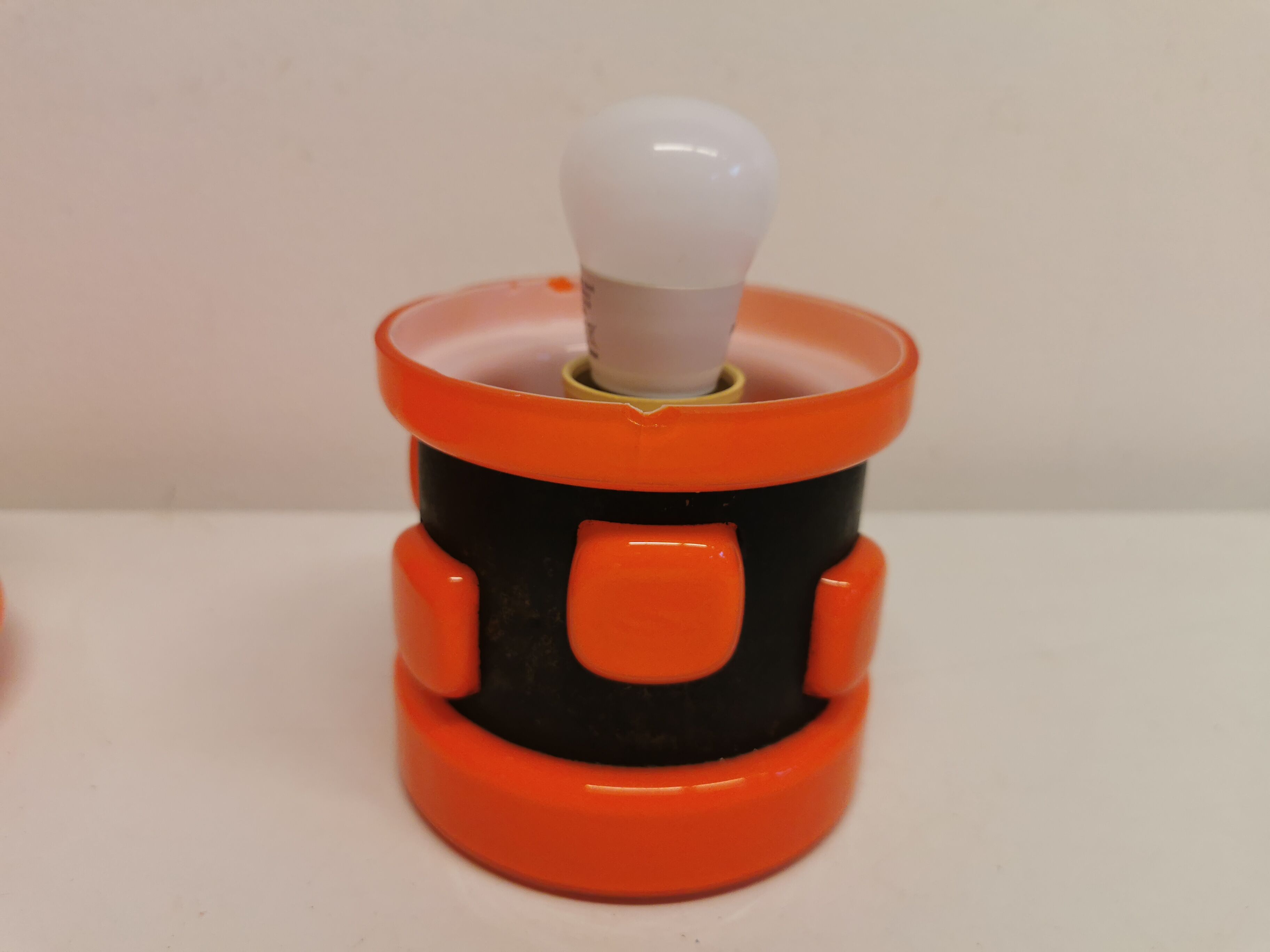 Table lamp, made in red double layer glass with metal details. estimated from the 1960s