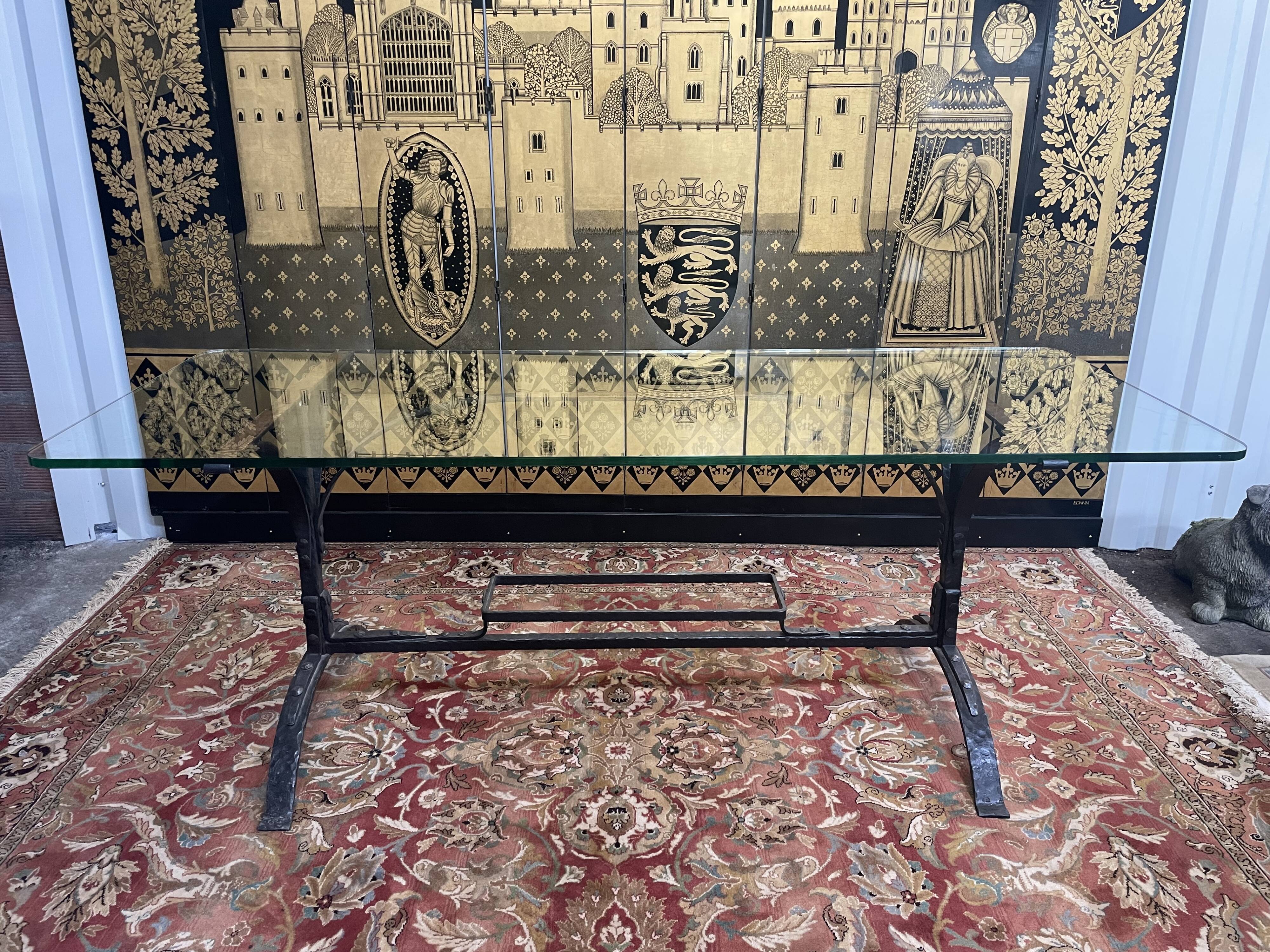 Dining table in wrought iron and glass