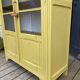 Antique yellow display cabinet