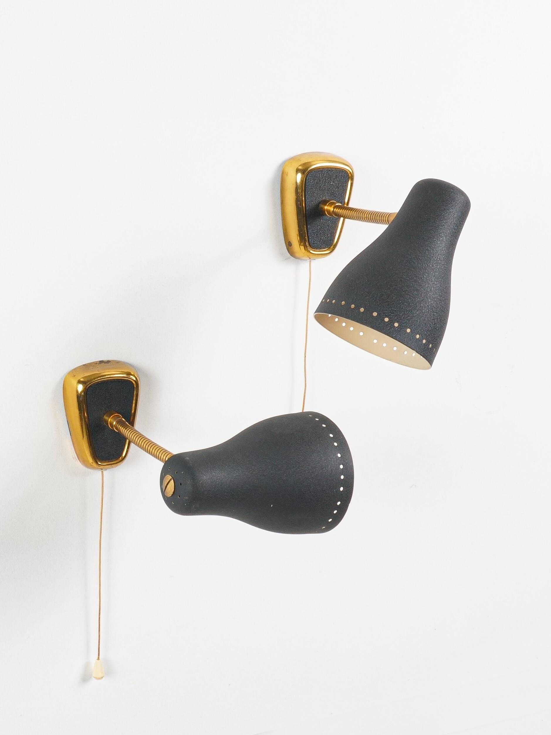 Jacques biny (designer) - pair of adjustable wall lights in brass & metal