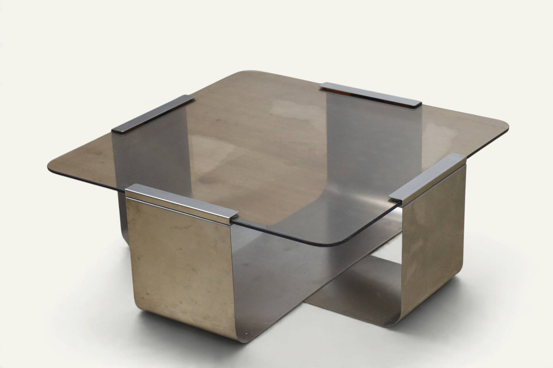 Brushed steel and smoked glass coffee table, by François Monnet – 1970s
