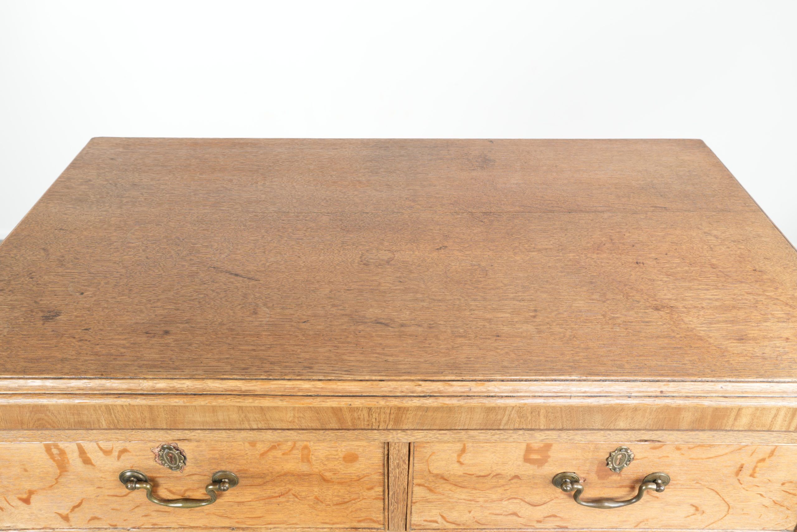 Large antique English blonde oak chest of drawers from the 18th century