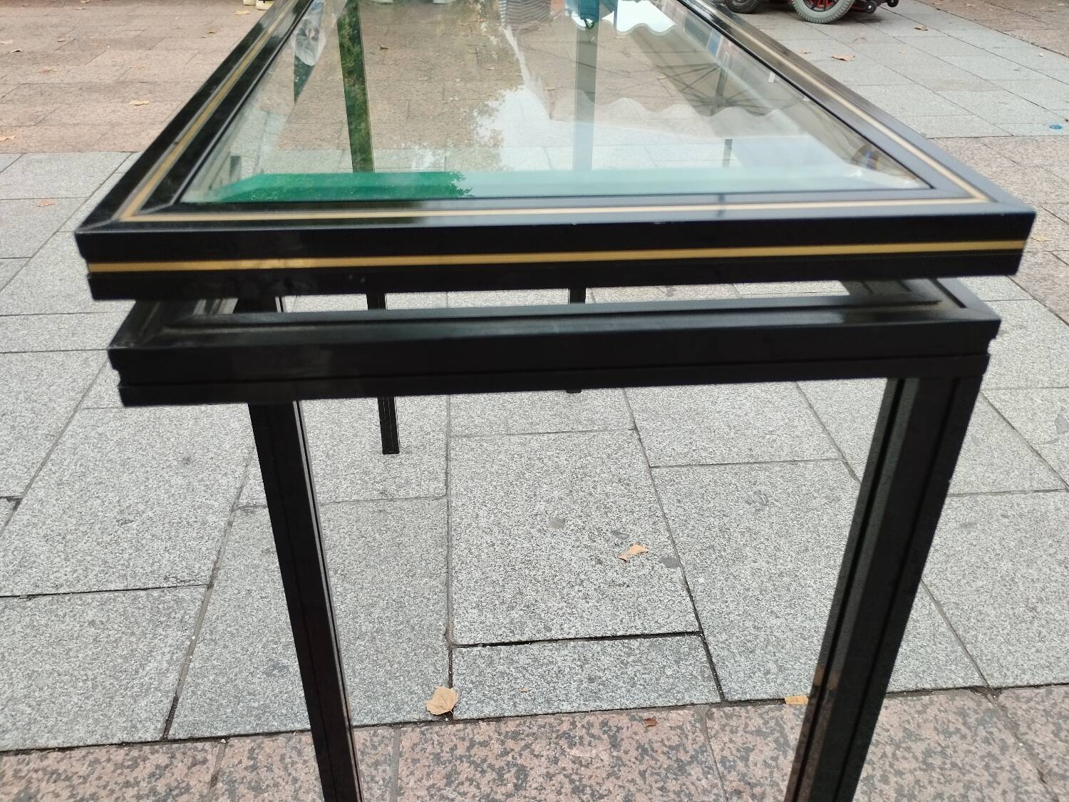 Old console with vintage glass top