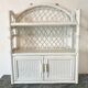 Rattan wall shelf
