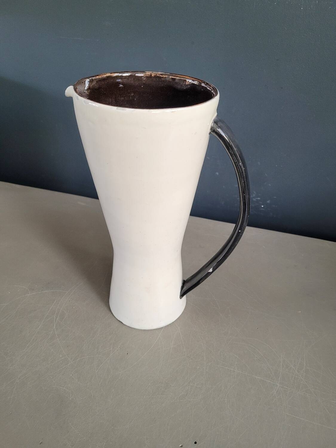 Vintage black and white diabolo pitcher