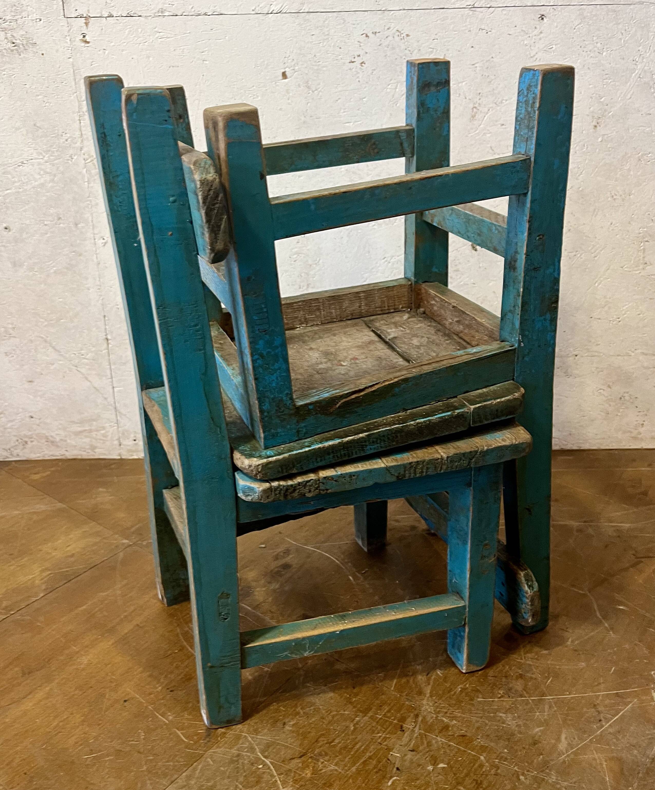 Old pair of small children's school chairs