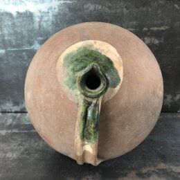 Large old jug cooked buried