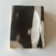 Symmetrical multicolored petrified wood soap dish