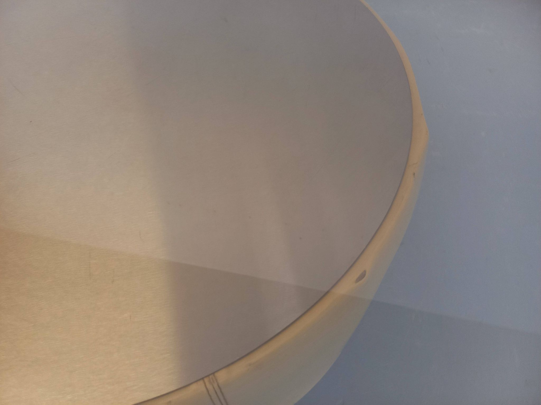 Vintage round coffee table in glass, leather, and metal in Space Age style from the 70s.