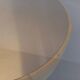 Vintage round coffee table in glass, leather, and metal in Space Age style from the 70s.
