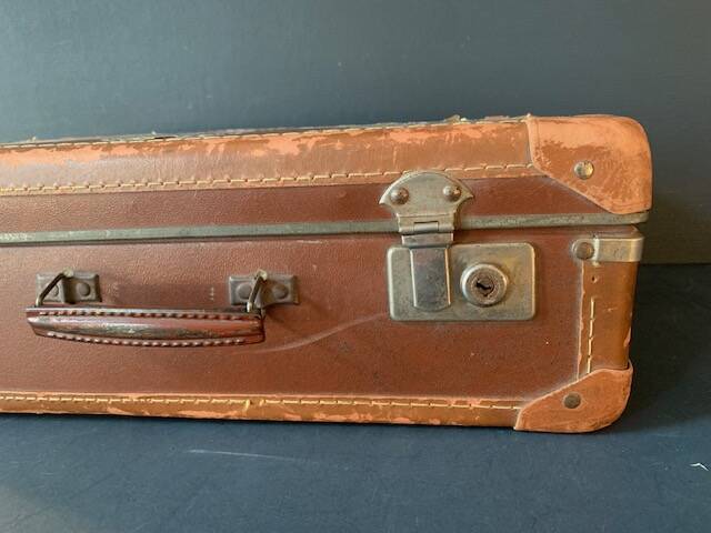 Old travel suitcase and legendary stickers, 1920