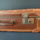 Old travel suitcase and legendary stickers, 1920
