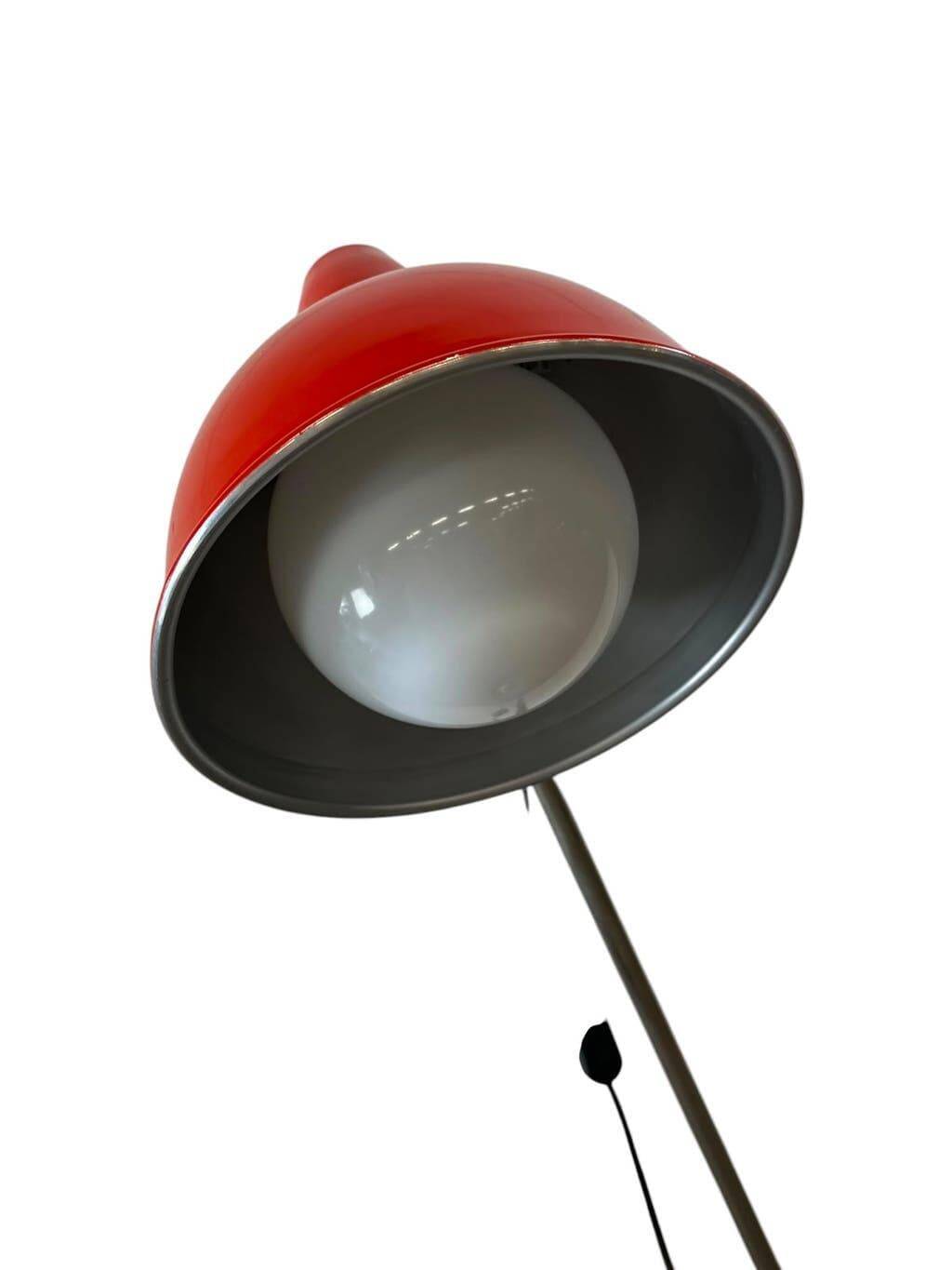 Vintage orange-red floor lamp with chrome.