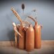 Trio of sandstone bottles
