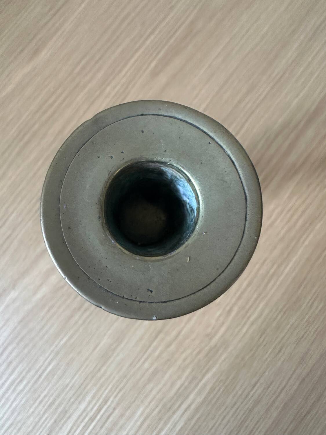 Old brass pull candle holder