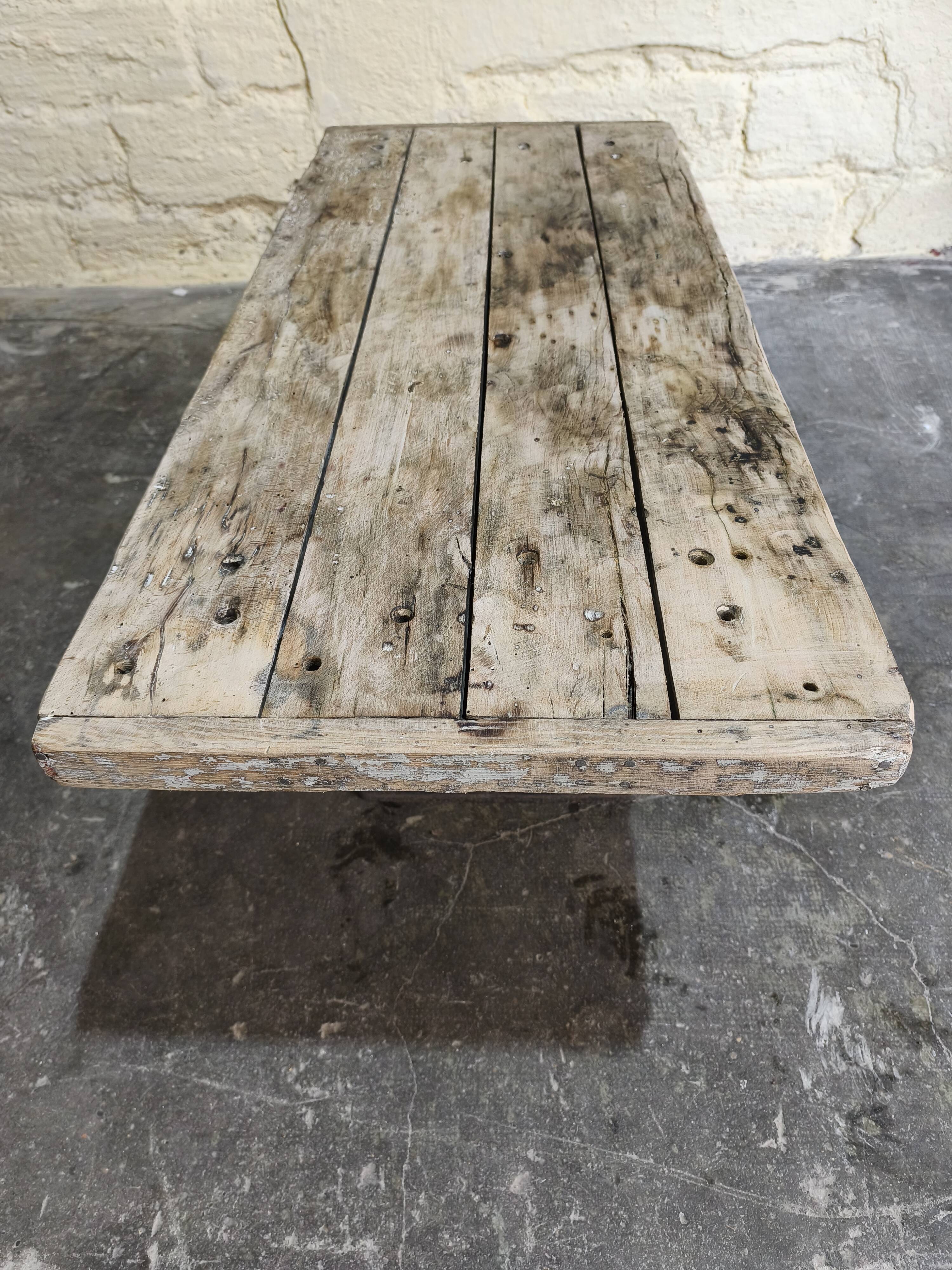 Solid oak coffee table with industrial cast iron legs