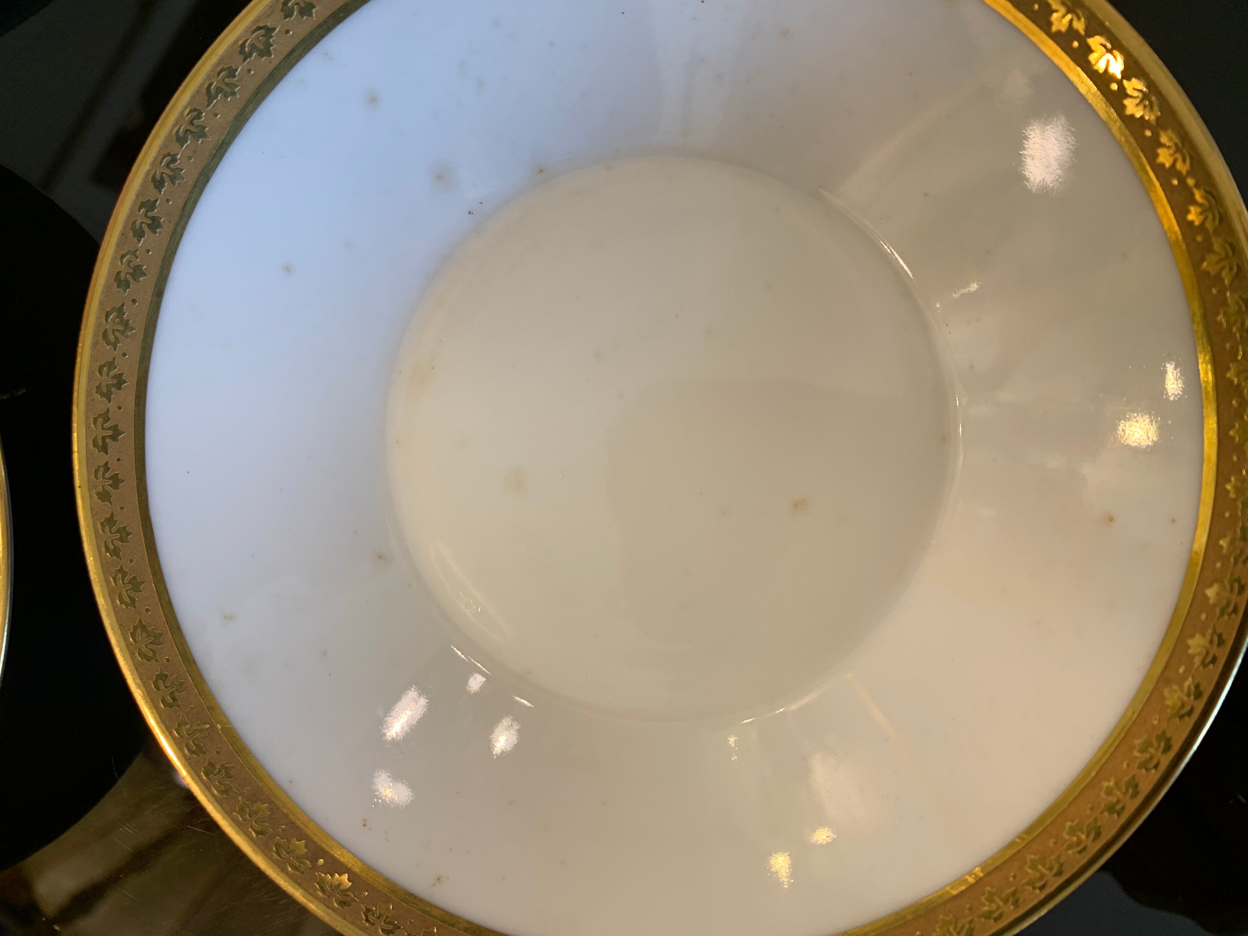 12 coffee cups and 12 white porcelain cups of Gold Gold Limoges