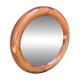 Round varnished wooden mirror