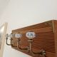 Wall-mounted coat rack with 4 ceramic hooks in blue and white, vintage style.