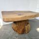 Organic brutalist coffee table in solid cedar, trunk pedestal, 1970s.