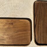 Trio of rounded rectangular trays or cups in monoxyl teak L:35