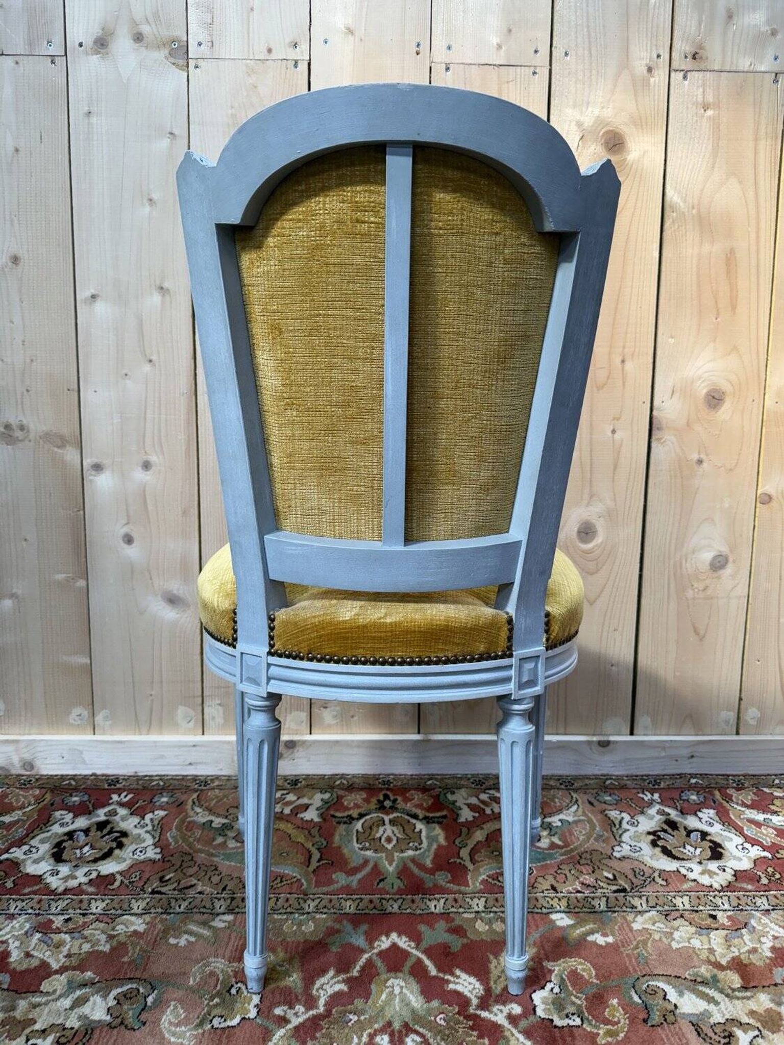 Set of 6 Louis XVI style chairs with polished wood and velvet.