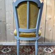 Set of 6 Louis XVI style chairs with polished wood and velvet.