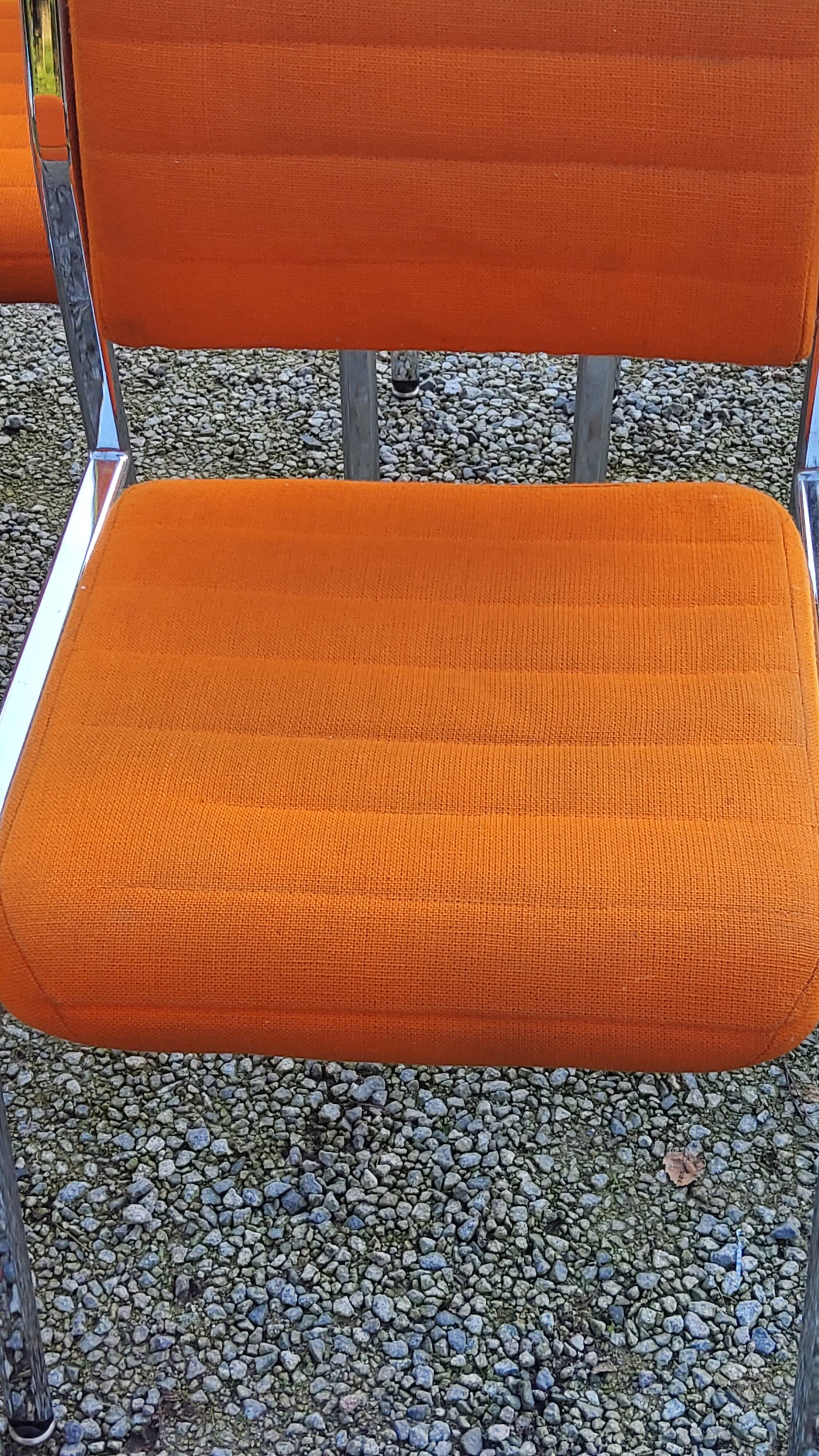 Set of 6 designer chairs from the 70s orange fabrics and chrome tubes