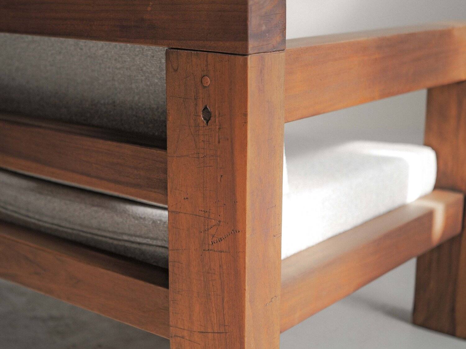 Handcrafted armchair in solid wood and fabric, 1980s-90s.