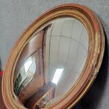 Miroir en bois doré patiné « oeil de sorcière » époque 1900  glace bombée e
