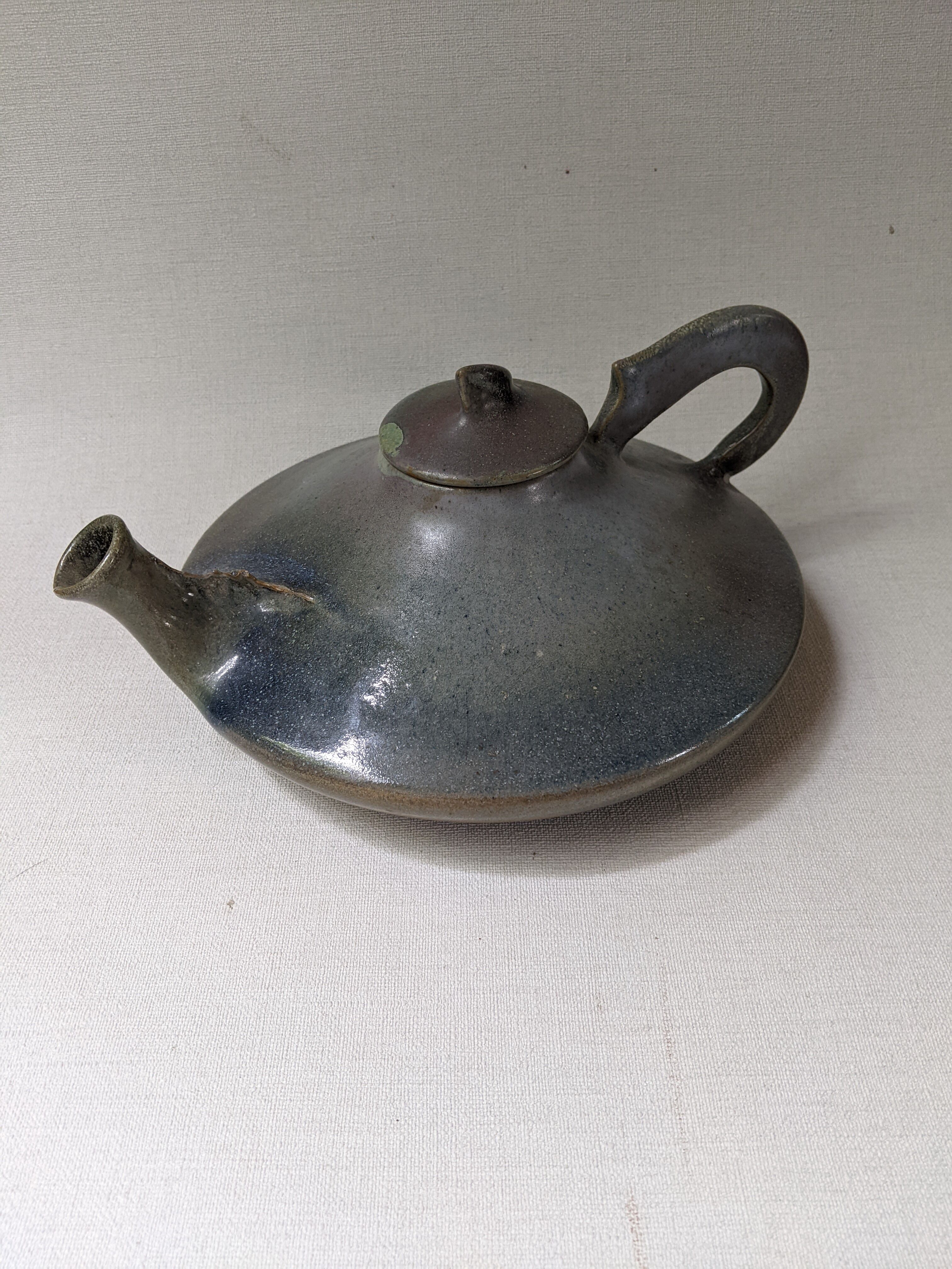 Ceramic teapot, artisanal, Japandi countryside decoration.