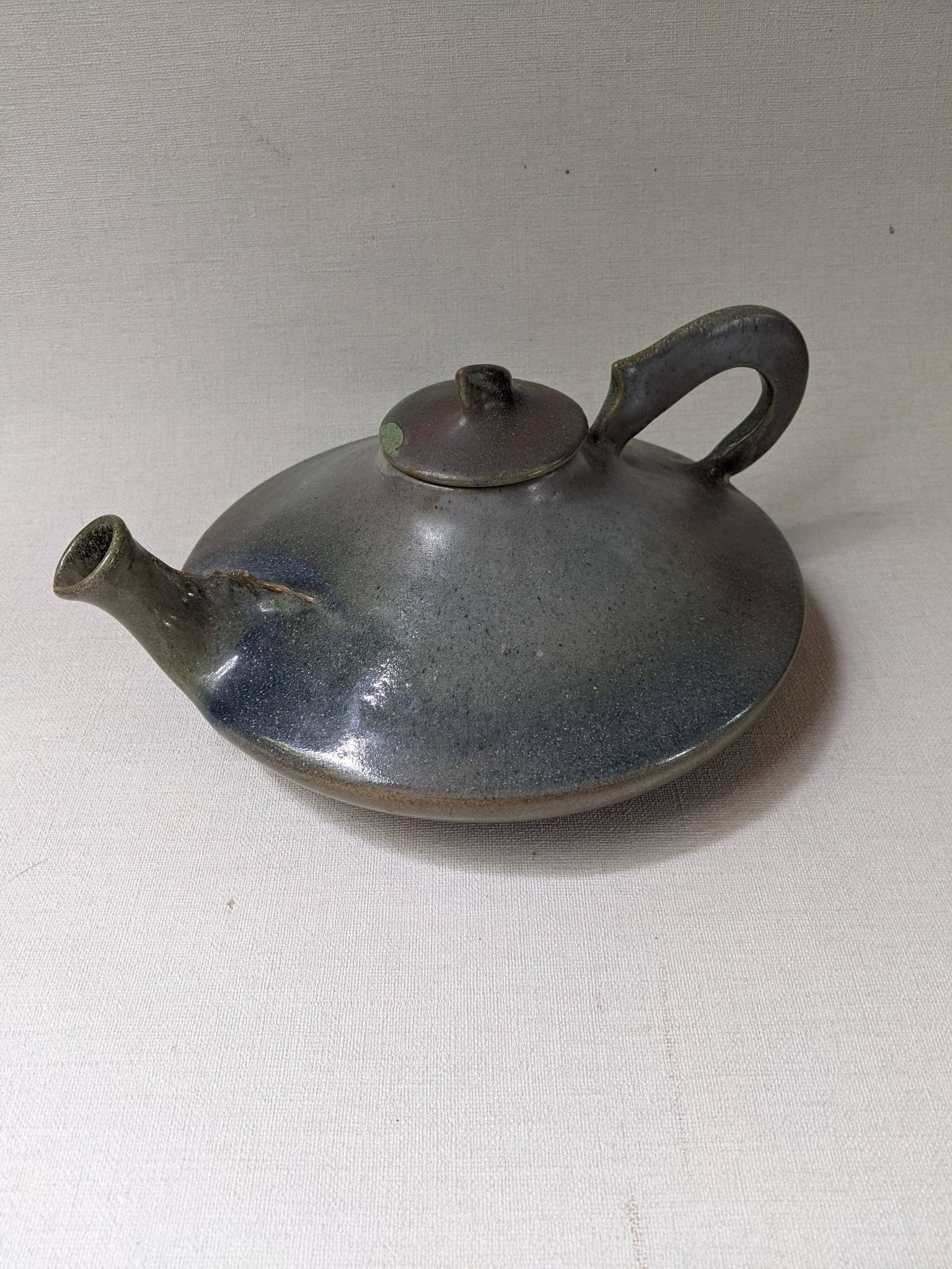 Ceramic teapot, artisanal, Japandi countryside decoration.